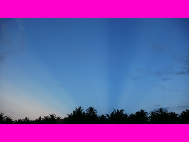 These are the very auspicious Blue Beams that appeared in the sky over our hotel during our Inspection Trip in May 2010. 

We were returning from a visit to the Tanah Lot Temple where we had asked its permission to hold our Master Cylinder here. And this is the answer we received!