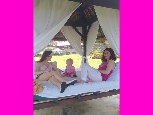 Maria, Eilidh, and Elspeth rest in a Balinese bure.